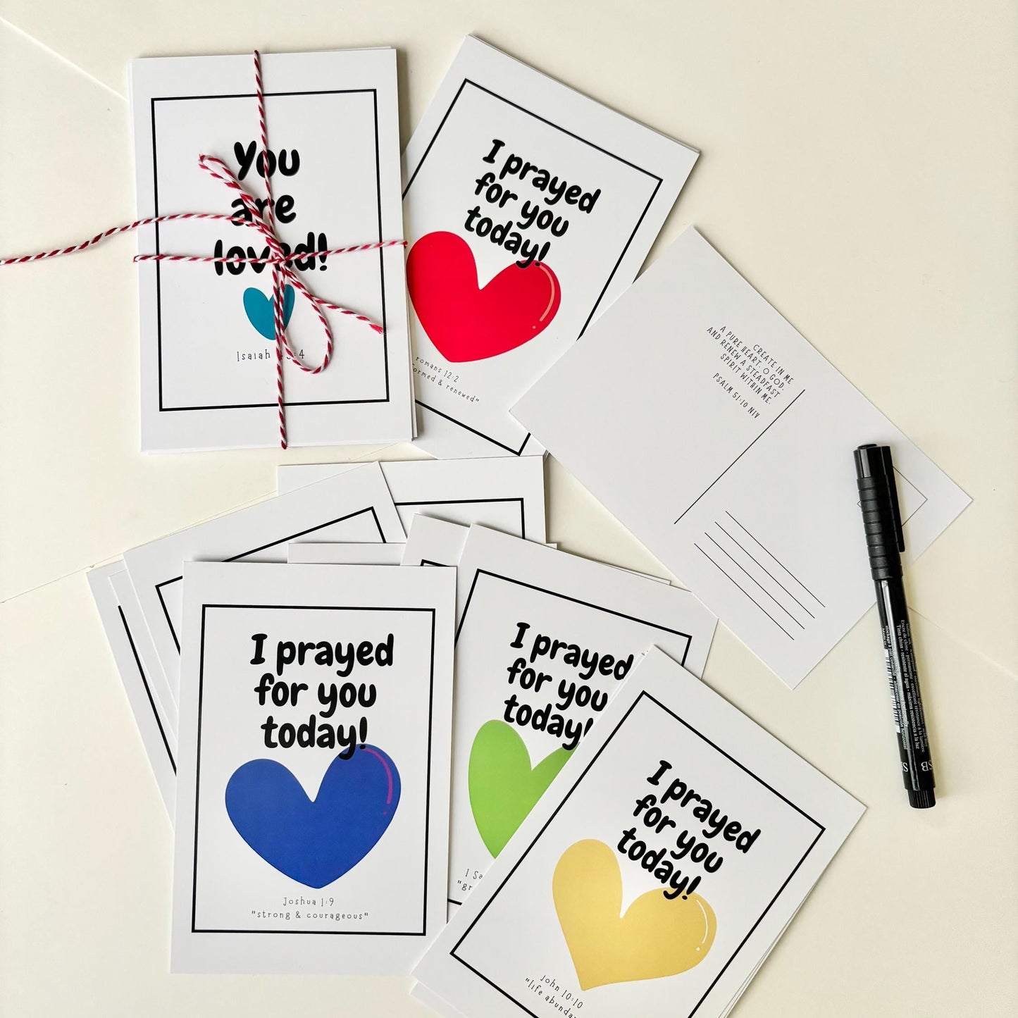 Set of cards with heart designs and text on a light background