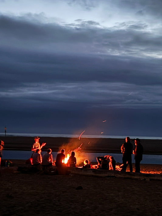 bonfire on the beach with family